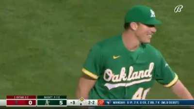 Shohei Ohtani waves at Chris Bassitt