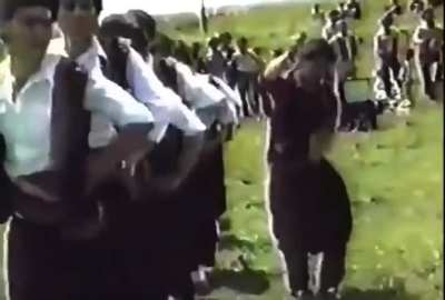 Efrînî Kurds dancing govend with a hammer and sickle (1980)