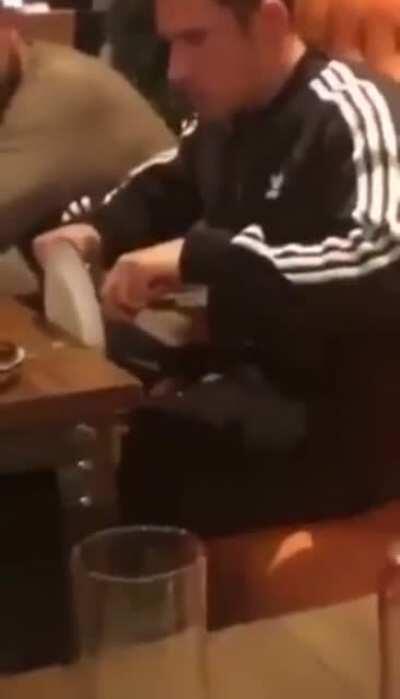 Cutting meat too close to the edge of the table