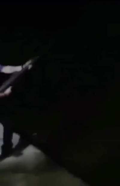 Sicario showing off his gun