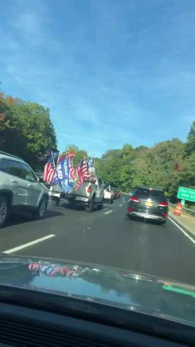 When one flag isn’t enough, so you block the view of all your mirrors with 15