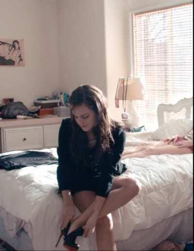 Emma Watson putting on shoes