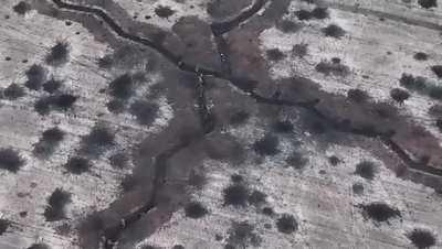 Ukrainian soldiers of the 92nd Mechanized Brigade assaulting a Russian trench. At 1:26, a Russian soldier shoots a friendly.