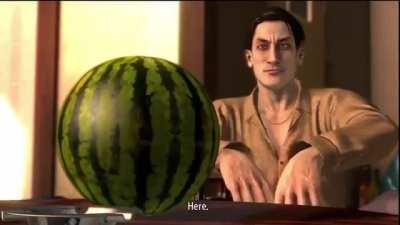 Majima gives watermelon to Kiryu