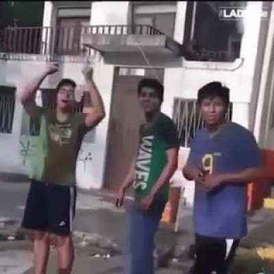 Man flips the bird and receives a water balloon