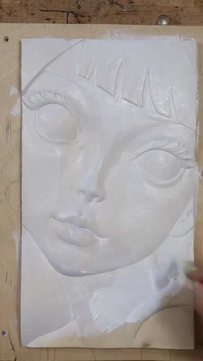 Girl with blue eyes woodcarving wood art