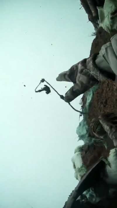 Ukrainian soldier shoots down a drone with a shotgun. Published 30 december 2024, location unknown