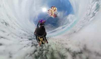 Shooting parachute with a flare gun