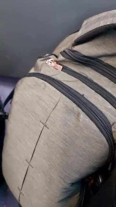 people with speakers on public transport