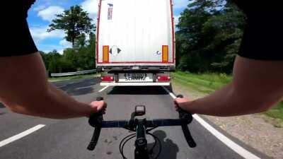 HMRB while I draft this truck at 50mph on a bicycle