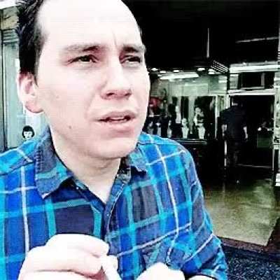 Trixie smoking a cigarette with two hands