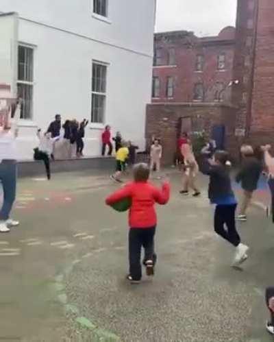 Their teacher promised them hot chocolate if she made the shot
