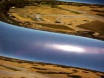 Camera falls from plane and camera’s spin matches the camera’s frame’s per second.