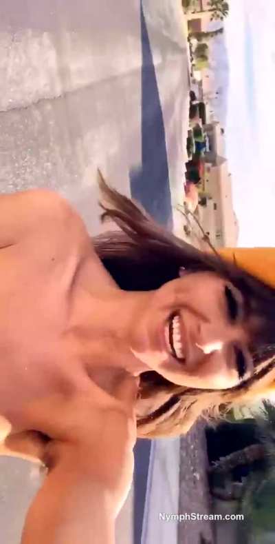 Riley Reid Recording Herself Driving a Toy Car Down a Residential Street in The Middle of The Day Completely Nude