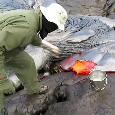 Greggs staff filling a Steak bake just before the lunch time rush