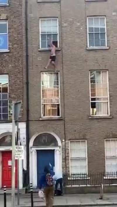 Guy on drugs falls out a window on capel street in Dublin