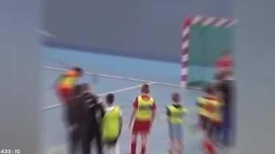 Boy shoots a penalty, ends up scoring a basket with his shoe after scoring a goal with said shoe