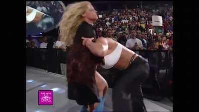 Trish attacks Lita behiind from ringside and chokes her out on Smackdown July 13, 2000