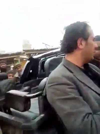 Taliban sets musical instrument on fire in front of a musician who is crying