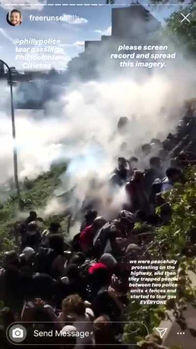 Philly cops disrupt peaceful protest by trapping protesters against a fence and repeatedly tear gasing them without any warning to disperse.