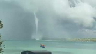 A tornado makes its way across Torch Lake, MI
