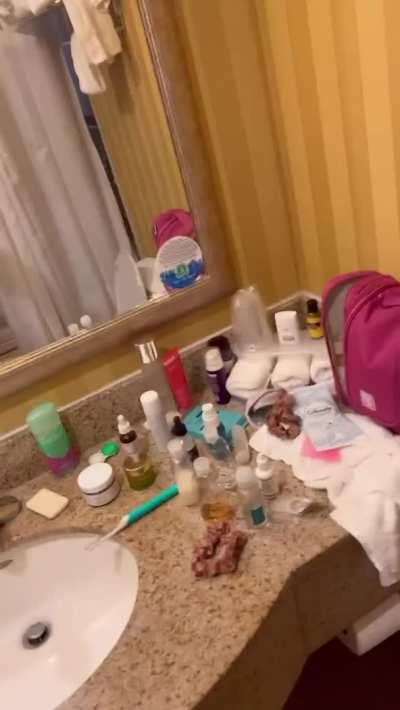 Beautiful tgirl shows off her body in the mirror