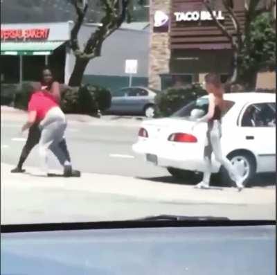 Dumb bitch gets her face smashed for smashing a car window