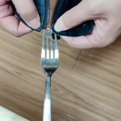 Fixing a zipper with a fork