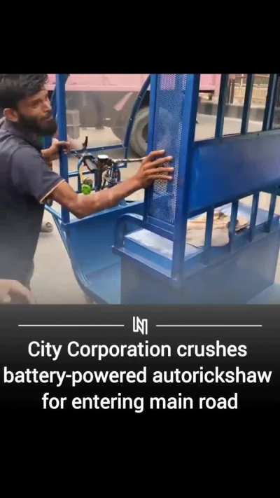 City Corporation crushes a poor man's electric rickshaw for entering main road