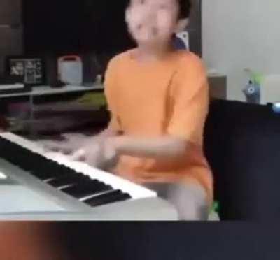 Crazy Talented and Weirdly Expressive Piano Kid (don't know who to credit)
