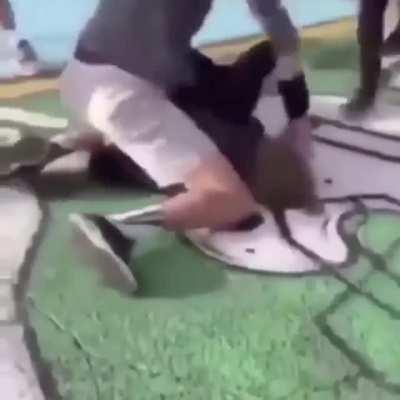 Wrestler slams guy on concrete