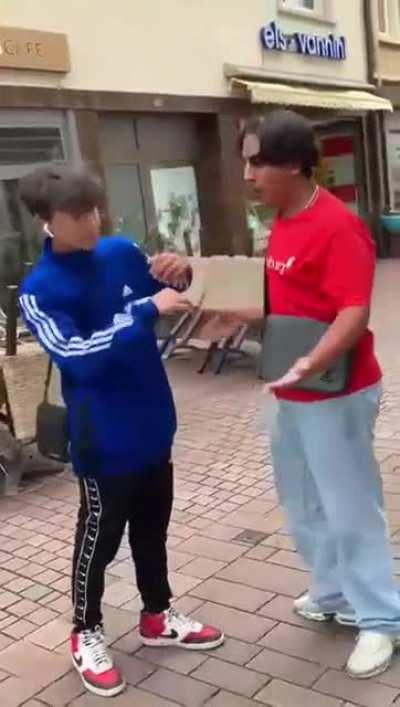 2 12 to 13 year olds herass and punsh 2 other 12 and 13 year old kids on the street