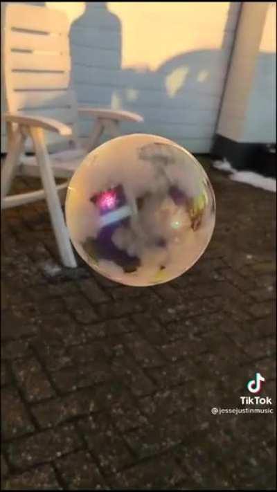 Bubble freezes mid air