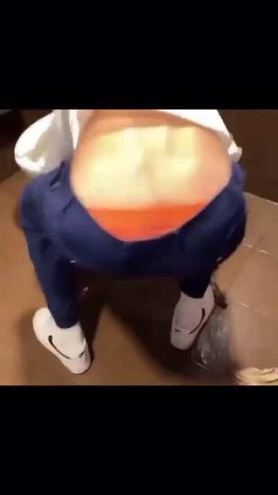 Peeing on the floor in a public bathroom