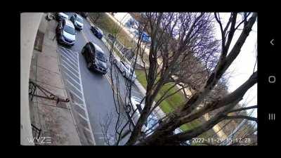 Honks at red truck yielding, passes in wrong lane.