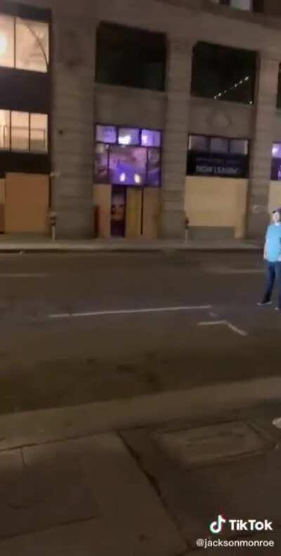 Police fire on two men protesting peacefully