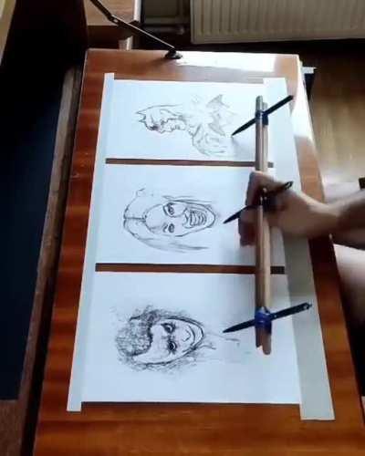 This man can draw multiple pictures at the same time
