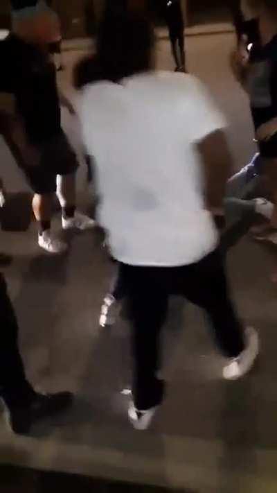 Protestors in Indianapolis get into a fight amongst eachother and gunshots ring out