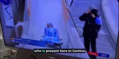 Swiss TV commentator reminding everyone of the competing bobsleigh team member's war crimes