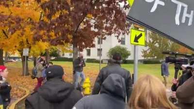 Mob harassing a person