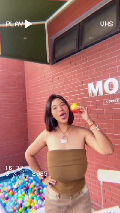 Busty Asian Girl in brown