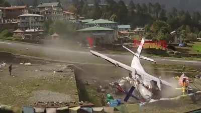 Plane crashes into two helicopters while taking off