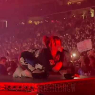 Billie Eilish on her knees