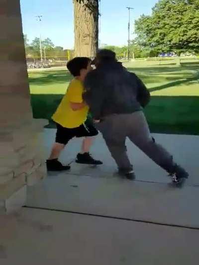 Kid tries to fight an older man