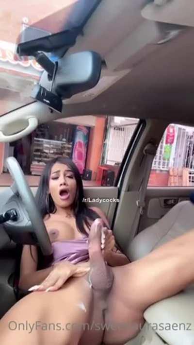 She s4rokes her massive cock and cums in her car