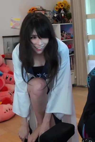 Emiru putting on a sock - March 2024