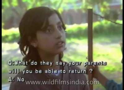 A Kashmiri Hindu girl talks to a reporter from a refugee camp with hope of returning to Kashmir in 1990s. Majority Population in Kashmir launched a Genocide against minority kashmiri pandits forcing thousands too flee and seek refuge in other States of th