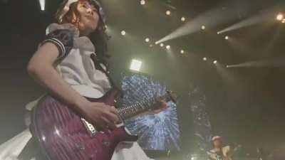 Her name is Mincho. She plays guitar. Enough said. P.4