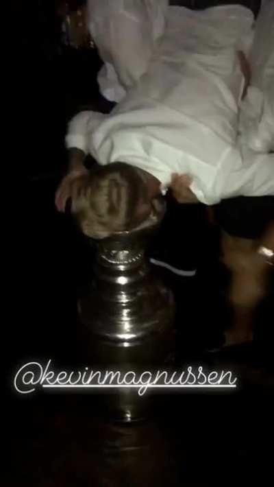 Kevin Magnussen (Formula 1 driver) drinking from the Stanley Cup
