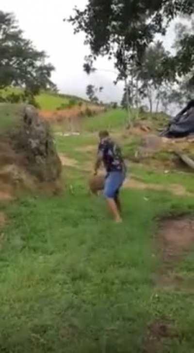 Man jumping over sheep